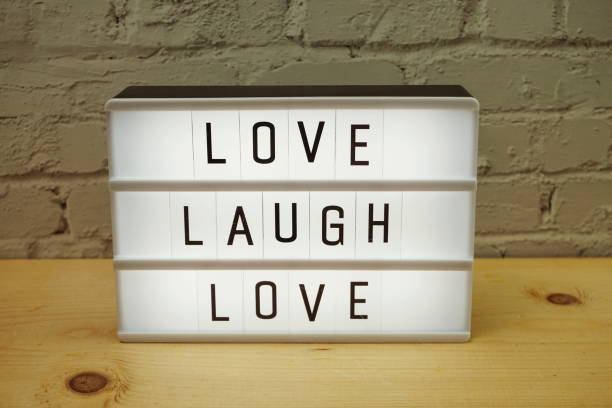 istock Live Laugh Love word in light box 1264417374