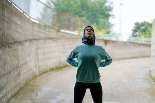 istock Muslim sporty woman prepares for workout 1264417621