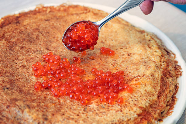 istock freshly baked pancakes with red caviar on white plate 1264423717