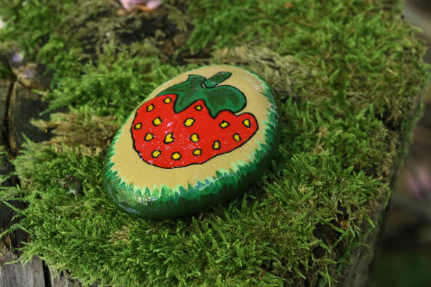 istock A painted hiking stone is left on the walking path for passersby to see 1264427249