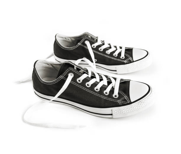 istock Black sneakers isolated on white background 1264427299