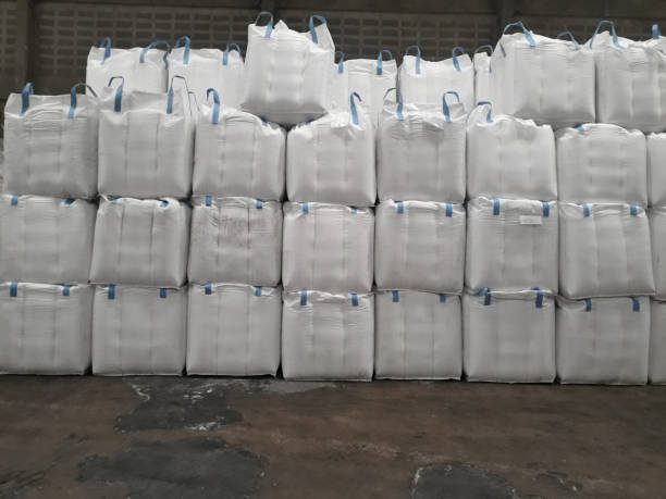 Chemical fertilizer jumbo-bag Stock pile Chemical fertilizer jumbo-bag in warehouse waiting for shipment. silo bag stock pictures, royalty-free photos & images