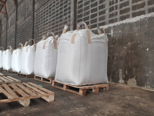 Chemical fertilizer jumbo-bag Stock pile Chemical fertilizer jumbo-bag in warehouse waiting for shipment. silo bag stock pictures, royalty-free photos & images