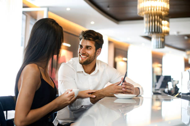 istock Young couple at a bar counter 1264439567