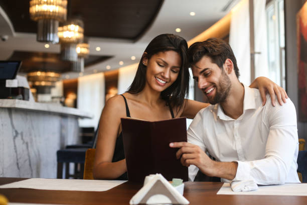 istock Young couple in a restaurant 1264439772