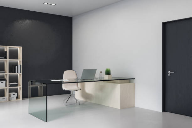istock Contemporary manager workplace interior with laptop on glasses table 1264439847