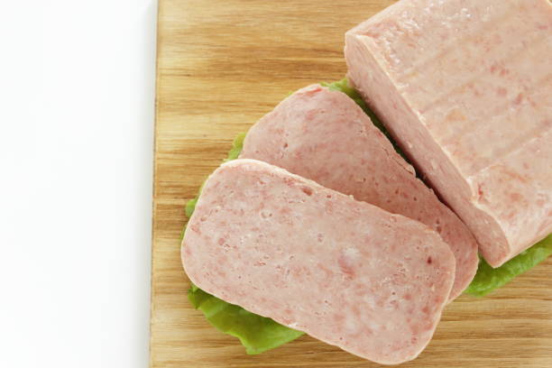 istock sliced luncheon meat on wooden board 1264448956