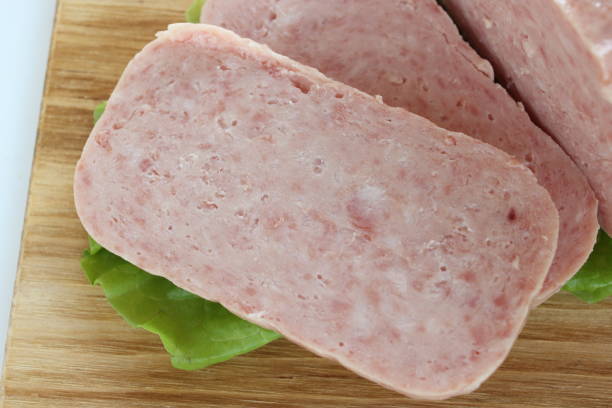 istock sliced luncheon meat on wooden board 1264448995