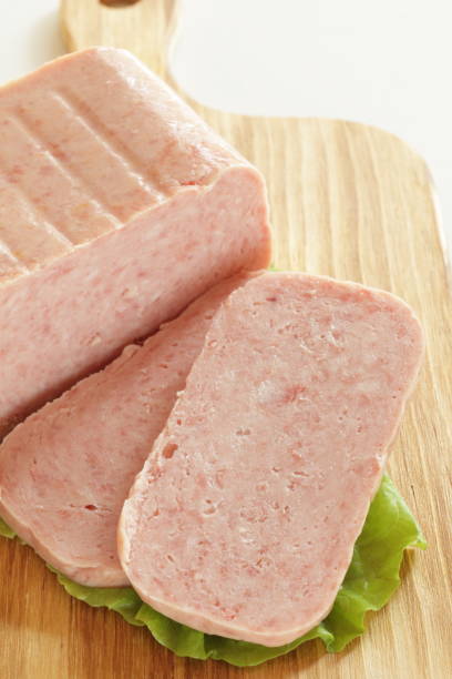 istock sliced luncheon meat on wooden board 1264449098