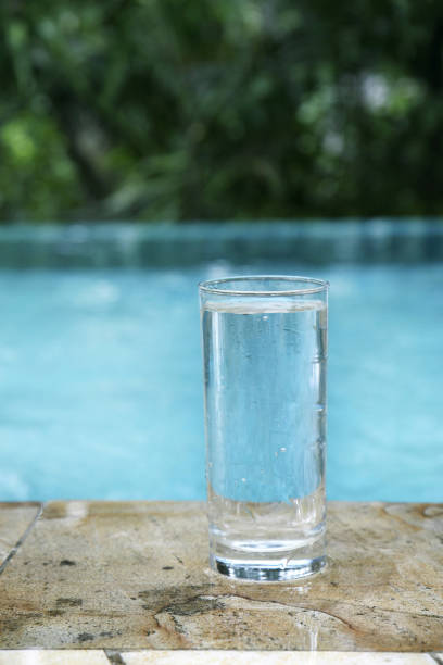 istock A glass of water by the poolside 1264453771