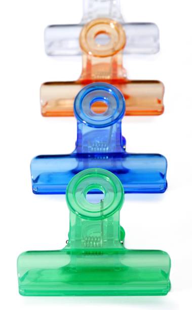 istock Colourful paper clips arranged in a row 1264453801