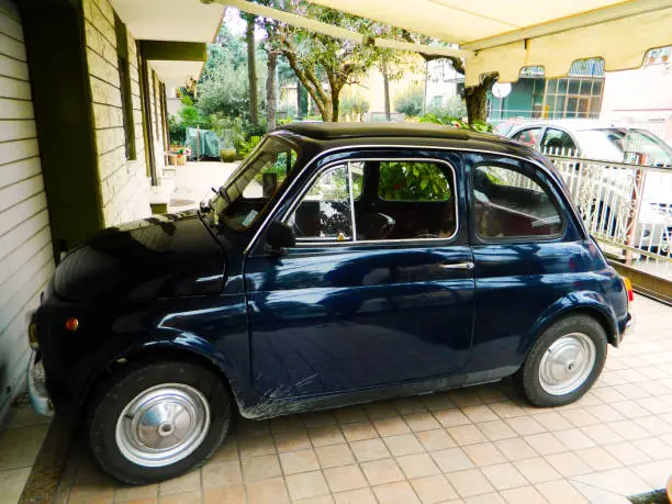 The Fiat is an italian small city car produced by Fiat Automobiles. Vintage italian mini car.