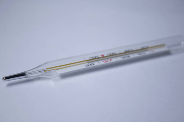 istock mercury thermometer on a white background. medicine and disease concept. Isolated 1264455872