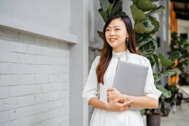 istock Young asian businesswoman going to work 1264463447