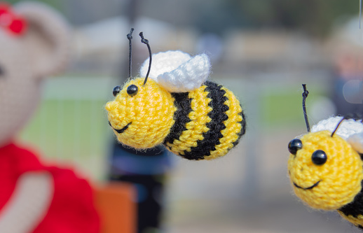 Fun handmade wool toy. Bee in flight