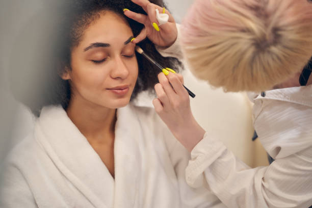 istock Skilled beauty specialist during working hours in salon 1264469300