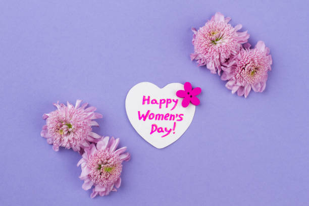 istock Happy women's day greeting card with pink flowers. 1264470882