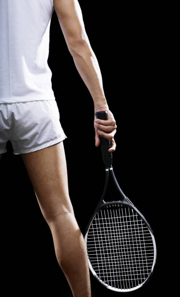 Man with a tennis racquet Man with a tennis racquet sports official stock pictures, royalty-free photos & images