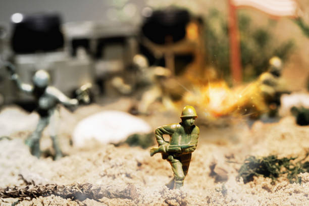 istock Toy soldiers fighting on battlefield 1264472525