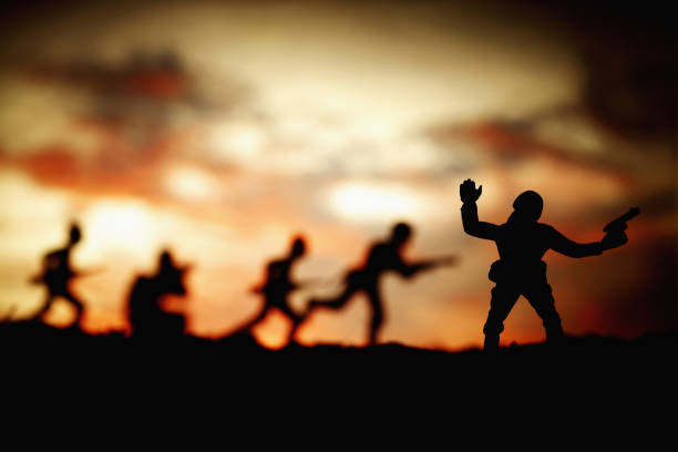 istock Toy soldiers fighting on battlefield 1264474703