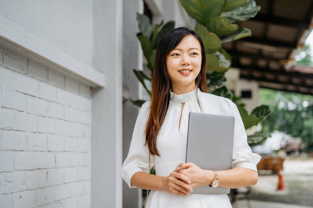 istock Young asian businesswoman going to work 1264479603