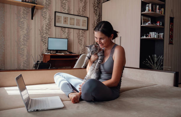 istock Young attractive smiling woman practicing yoga, sitting in Half Lotus exercise 1264482493