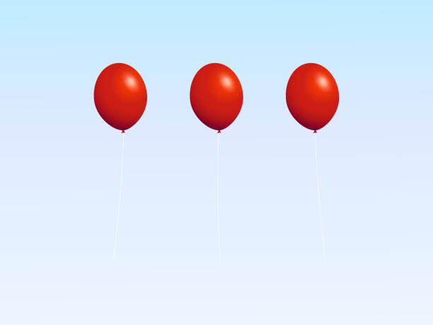 istock Trio of red balloons over white and blue background 1264482497