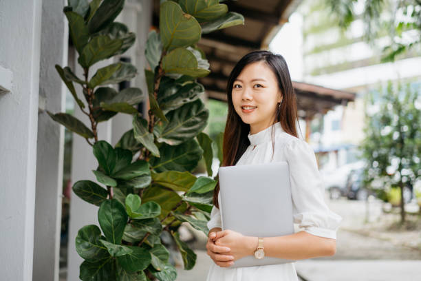 istock Young asian businesswoman going to work 1264484938