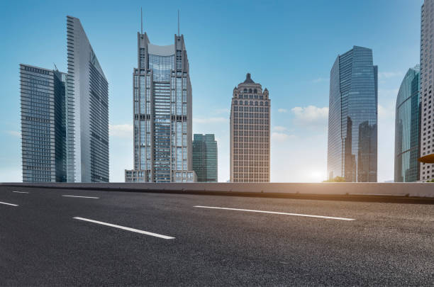 istock Urban road and modern architecture 1264489244