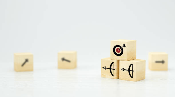istock stacked cubes with arrow symbols pointing towards a target - 3d illustration 1264493714