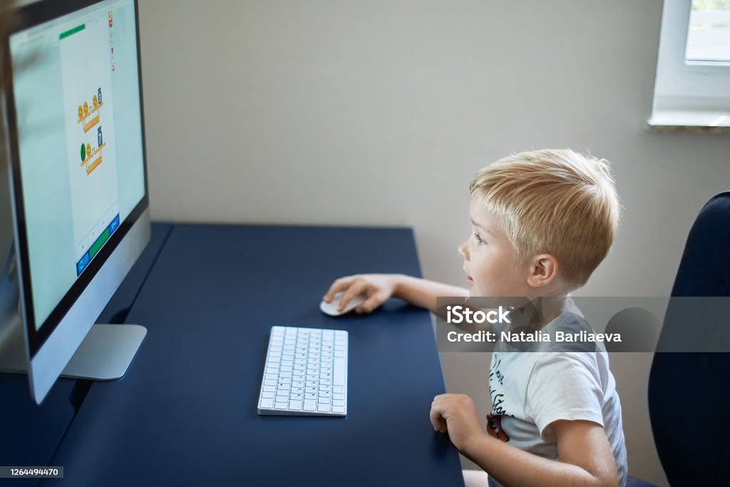 Child Study At The Computer Stock Photo - Download Image Now - Boys ...