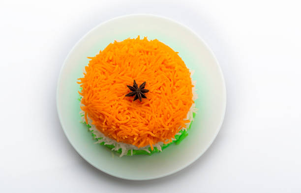 Indian Tricolor or Tiranga Rice for indian Republic and Independence day, served in a ceramic plate