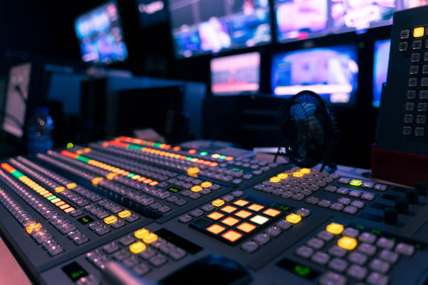 istock video switch of Television Broadcast, working with video and audio mixer, control broadcasts in recording studio. 1264508235