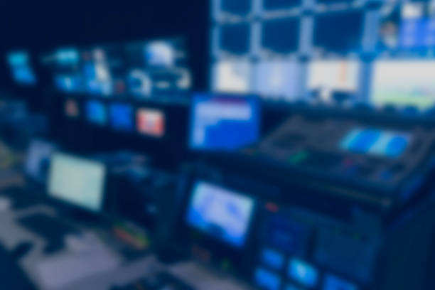 istock Blur image video switch of Television Broadcast, working with video and audio mixer, control broadcasts in recording studio. 1264510408