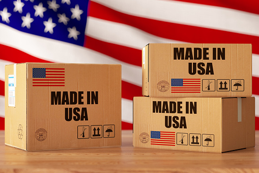Made in USA Concept with Cargo Boxes and American Flag. 3d Render
