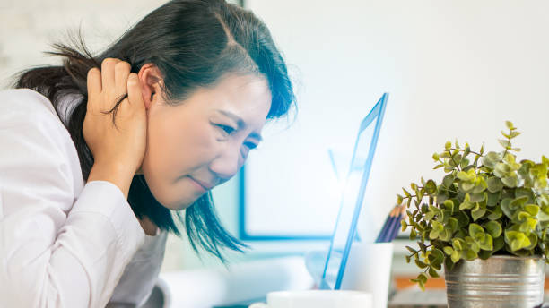 istock Beautiful female woman work office with technology computer effect blue light screen eyes health problem 1264512007