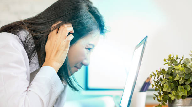 istock Beautiful female woman work office with technology computer effect blue light screen eyes health problem 1264512113