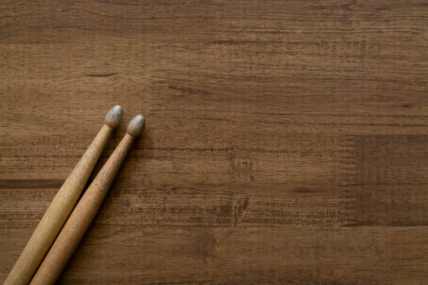istock Drum stick on wooden table background, top view, music concept 1264512765