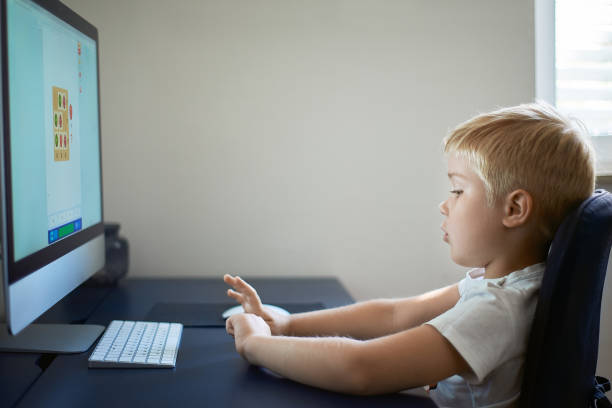 istock The child studies at home 1264515740