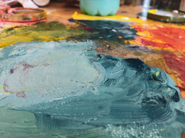 istock Blending colors on the palette 1264519757