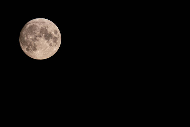 Beautiful full Moon Beautiful full Moon of August, August's Sturgeon Supermoon in a summer night. Moon above, on the left side and empty space on the right side for writing sturgeon fish stock pictures, royalty-free photos & images