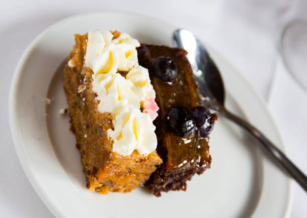 Image of tasty chocolate  sponge cake served with caramel cake at plate