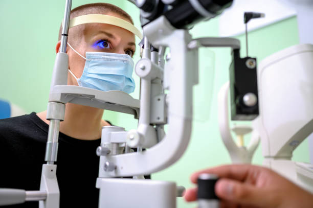 istock Woman having an eye exam at ophthalmologist's office 1264528275