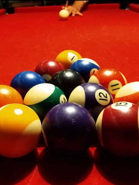 biliardo - pool game pool table aiming men foto e immagini stock