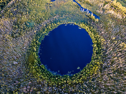 Bottomless circle Lake in forest of Solnechnogorsk District, Moscow region. Russia. Aerial view