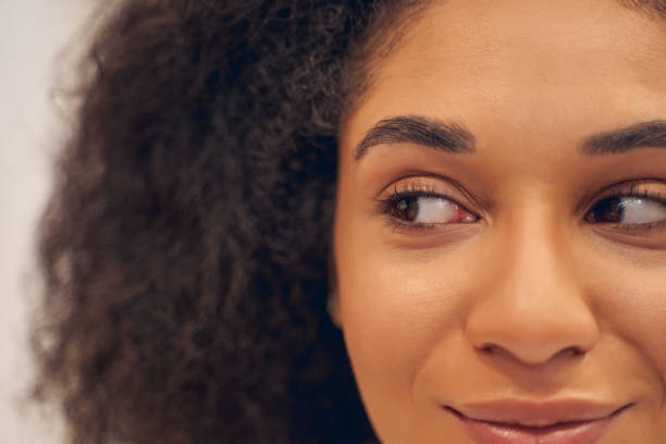 istock Pleasant attractive female looking away with positivity 1264533481