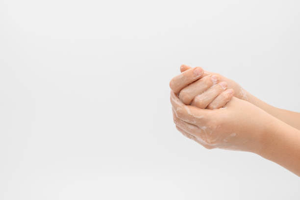 istock Soaping hands, process. Hands washing gesture, soapy female hand foam. Wash your hands concept. 1264536586