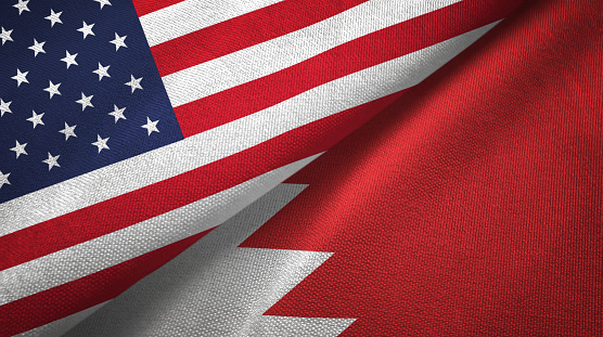 United States and Bahrain two folded flags together