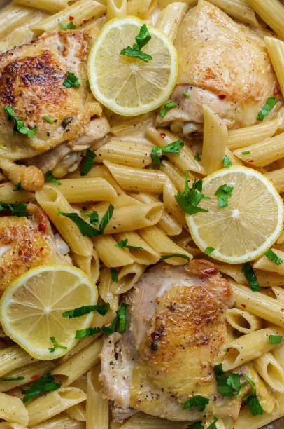 Skin-on bone-in chicken thigh piccata with penne pasta one-pot dish