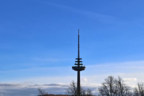 istock Industry pollution from factory smoestacks in a deep blue sky 1264553741